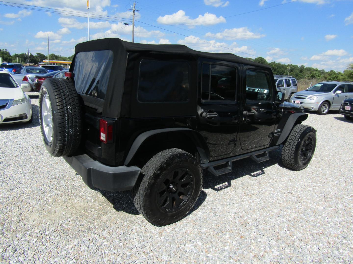 2015 Black /Tan Jeep Wrangler (1C4BJWDG8FL) with an V6 engine, Automatic transmission, located at 15016 S Hwy 231, Midland City, AL, 36350, (334) 983-3001, 31.306210, -85.495277 - Photo#7